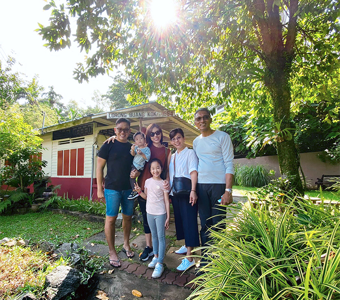 a family visiting the kampong on the heritage trail