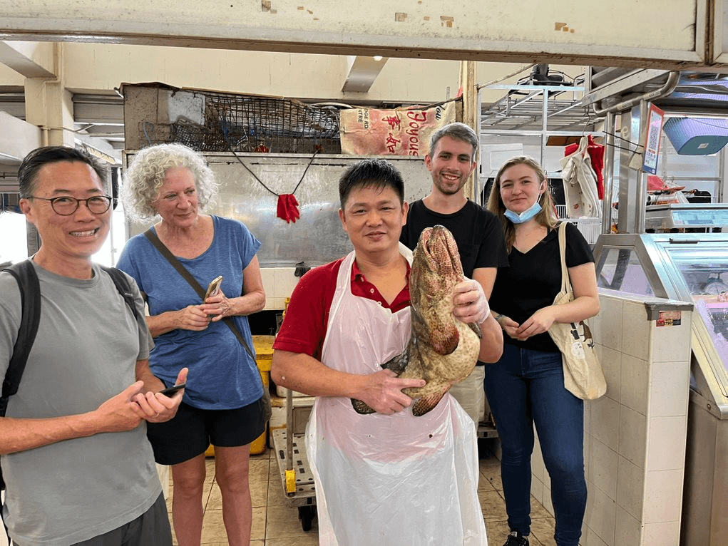 visit a local wet market with a local tour guide